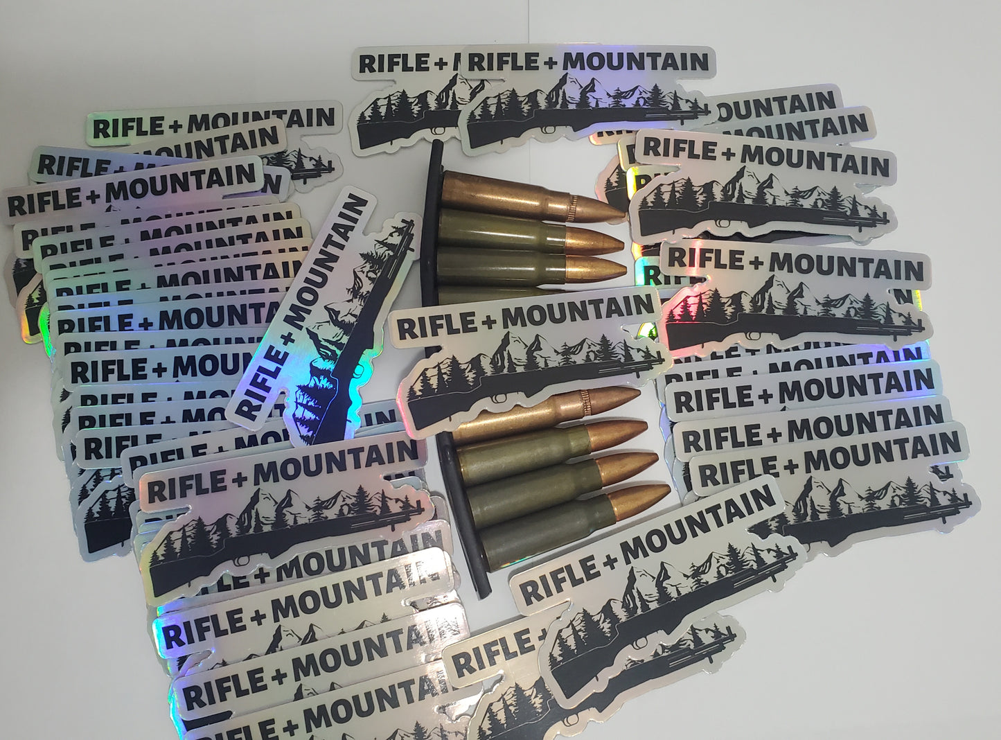 Rifle and Mountain Holographic Sticker